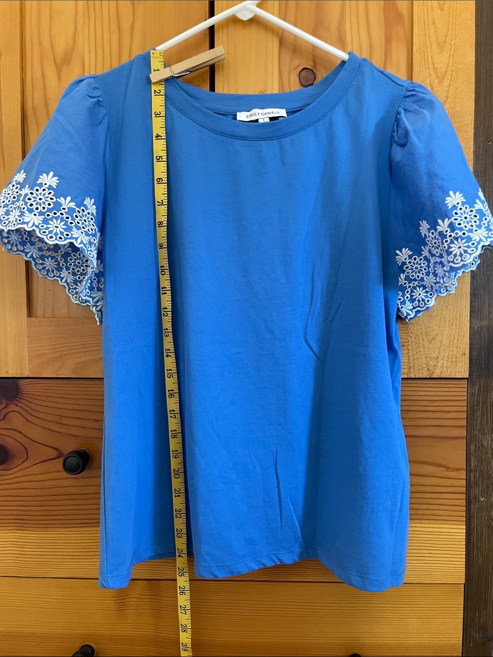Blue eyelet sleeved top size L